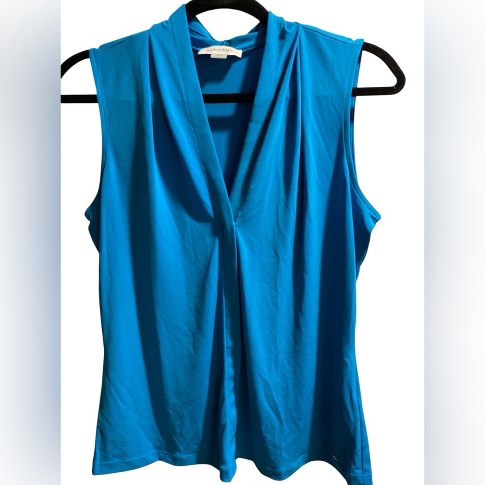 Calvin Klein Teal Blue V-Neck Sleeveless Top with silver logo on hem